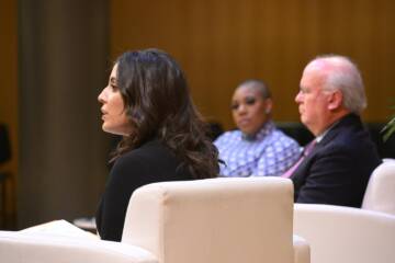 three people at a JHU event