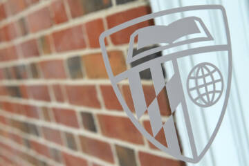 JHU shield on a window